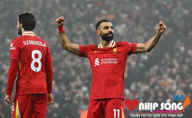 Mohamed Salah mừng bàn ấn định chiến thắng 3-1 trước Leicester ở vòng 18 Ngoại hạng Anh