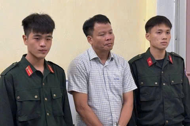 Bi can Dong Xuan Thu thoi diem moi bi bat