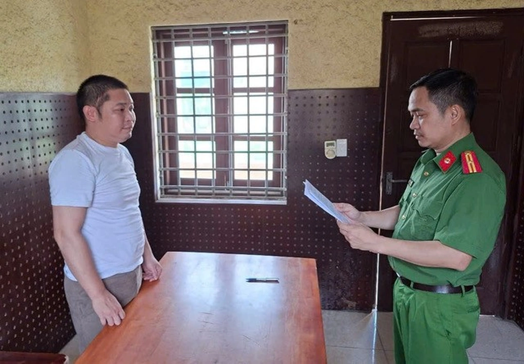 Le Van Cuong tai co quan cong an. 546778
